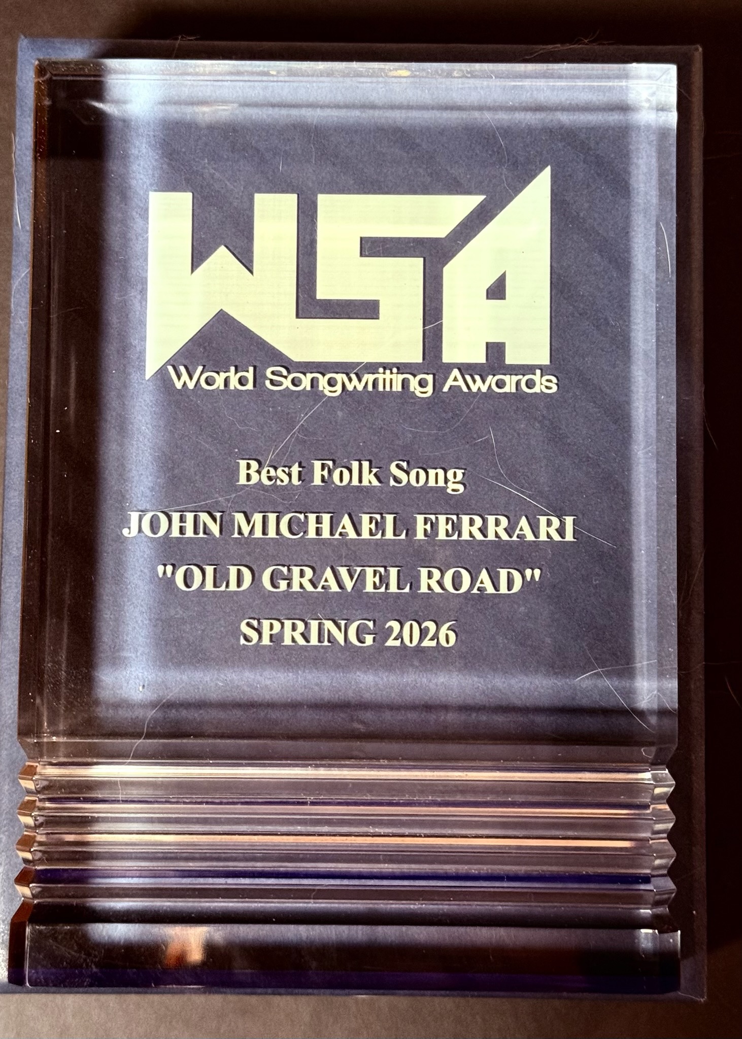 world song writing award best folk song old gravel road
